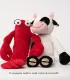 Peluche homard rouge à côté d’une peluche vache blanche et noire, pour chien