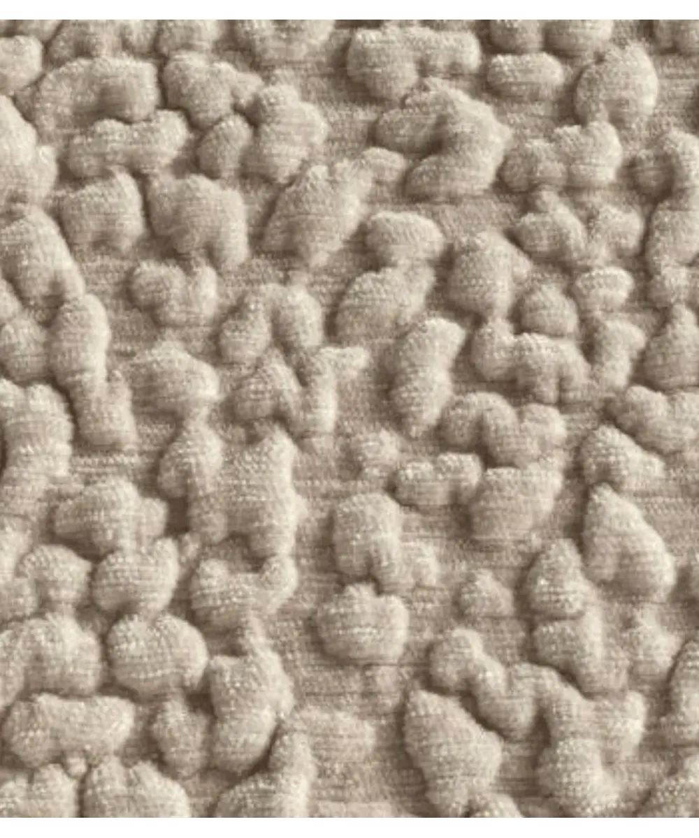 Gros plan sur le tissu bouclé beige texturé du lit pour chien Bellagio, Bella Concept Store Dog